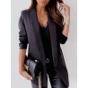 Veste blazer uni en manche longue.